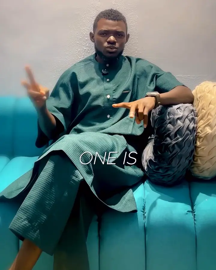 The Managing Director on a teal sofa answering "this or that" questions about land